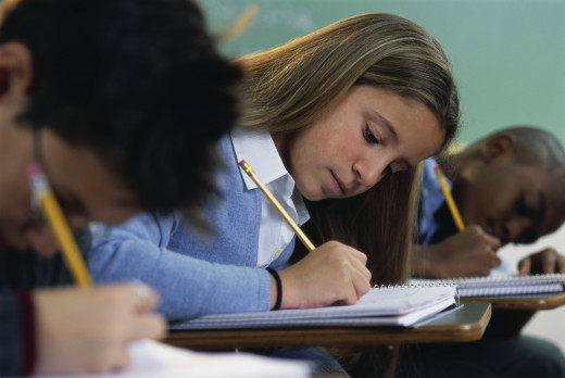 Students taking test in classroom
