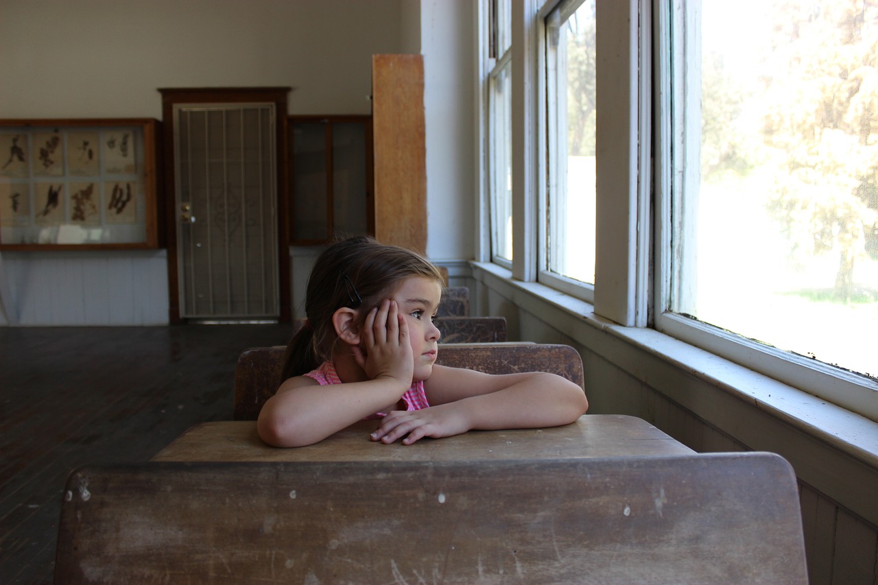 Child in Lonely Classroom