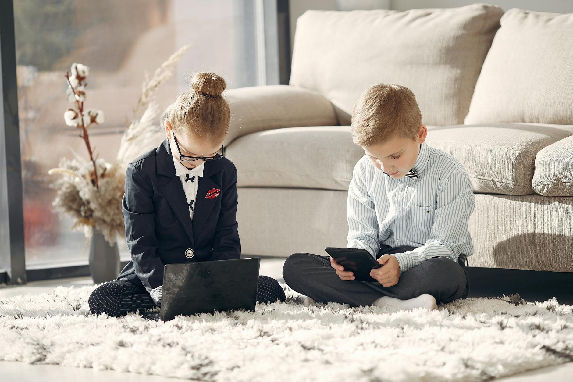 https://www.pexels.com/photo/full-body-of-concentrated-preschool-coworkers-using-gadgets-during-work-at-home-3874180/